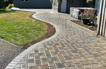 Concrete paver pathway by Harini Building Blocks